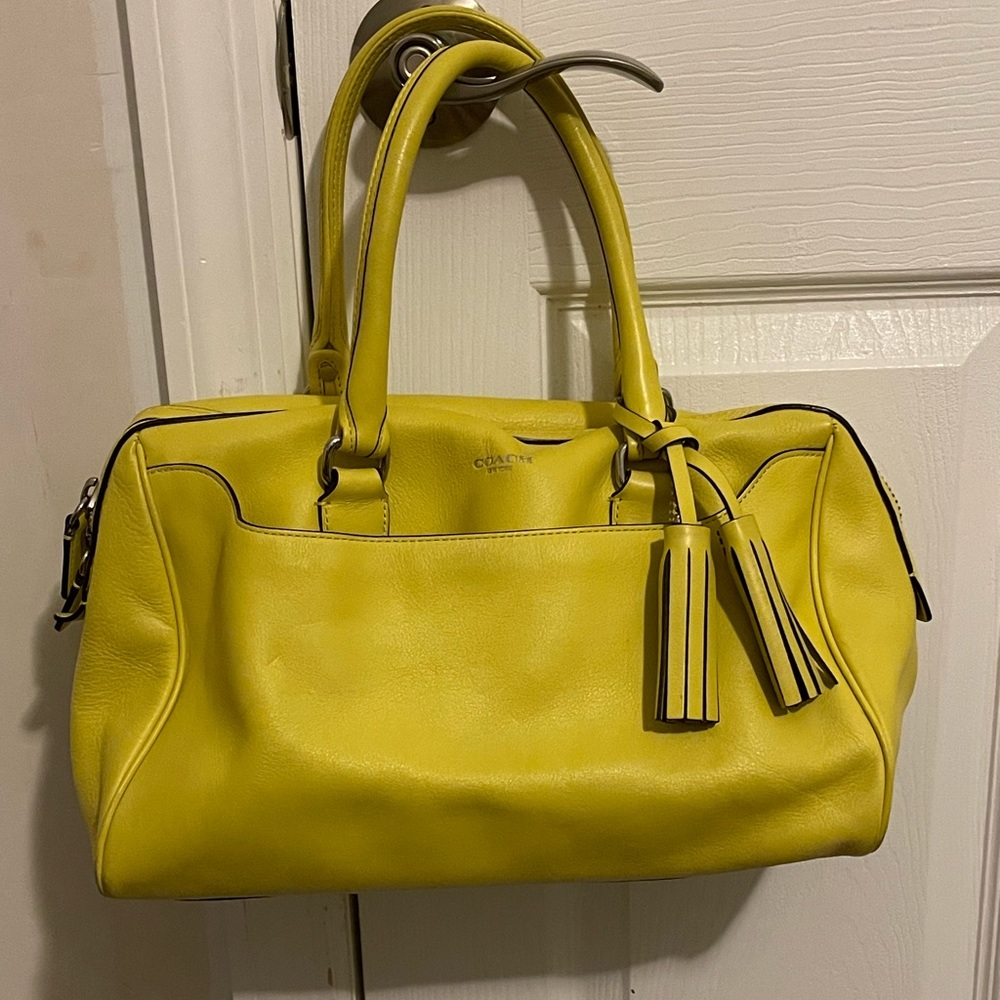 Coach yellow small duffel bag like new condition in duster